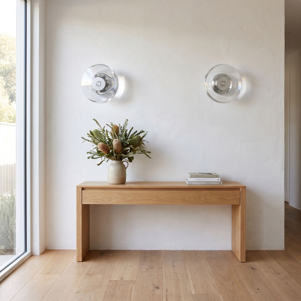 Slim Crystal Disc LED Wall Light in a pair on a wall of an Australian home