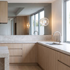 Slim Crystal Disc LED Wall Light on a kitchen wall