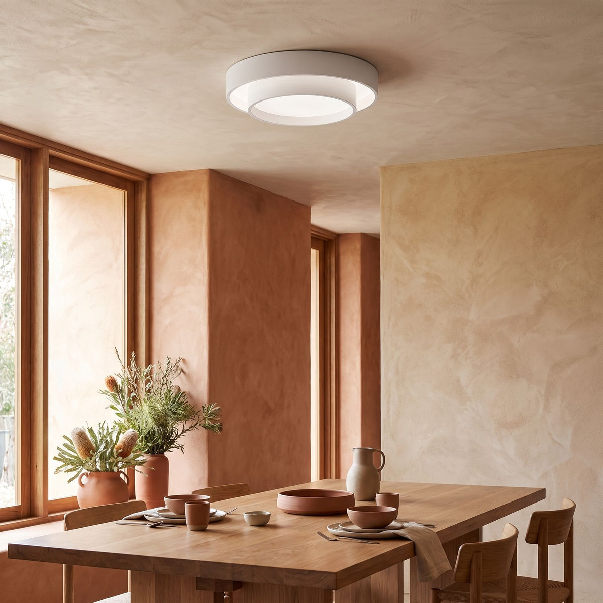Slim Cylinder Acrylic LED Ceiling Light above a dining table