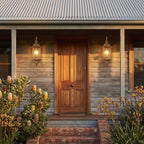 Slim Cylinder Brass Glass Outdoor Wall Light in a pair either side of an entry door