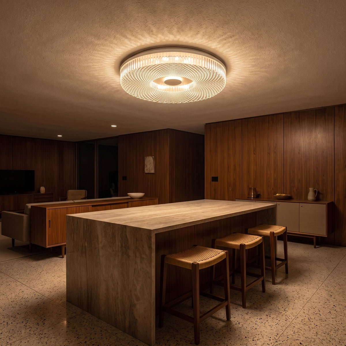 Slim Faceted Acrylic LED Flush Mount Ceiling Light above a kitchen island at night
