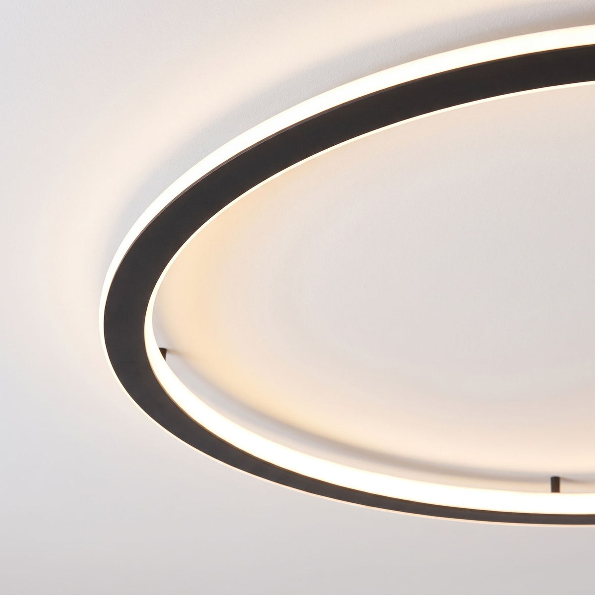 Close-up of the thin black aluminium ring and glowing diffuser