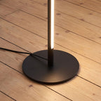 Close-up of the round base and the glowing aluminium rod
