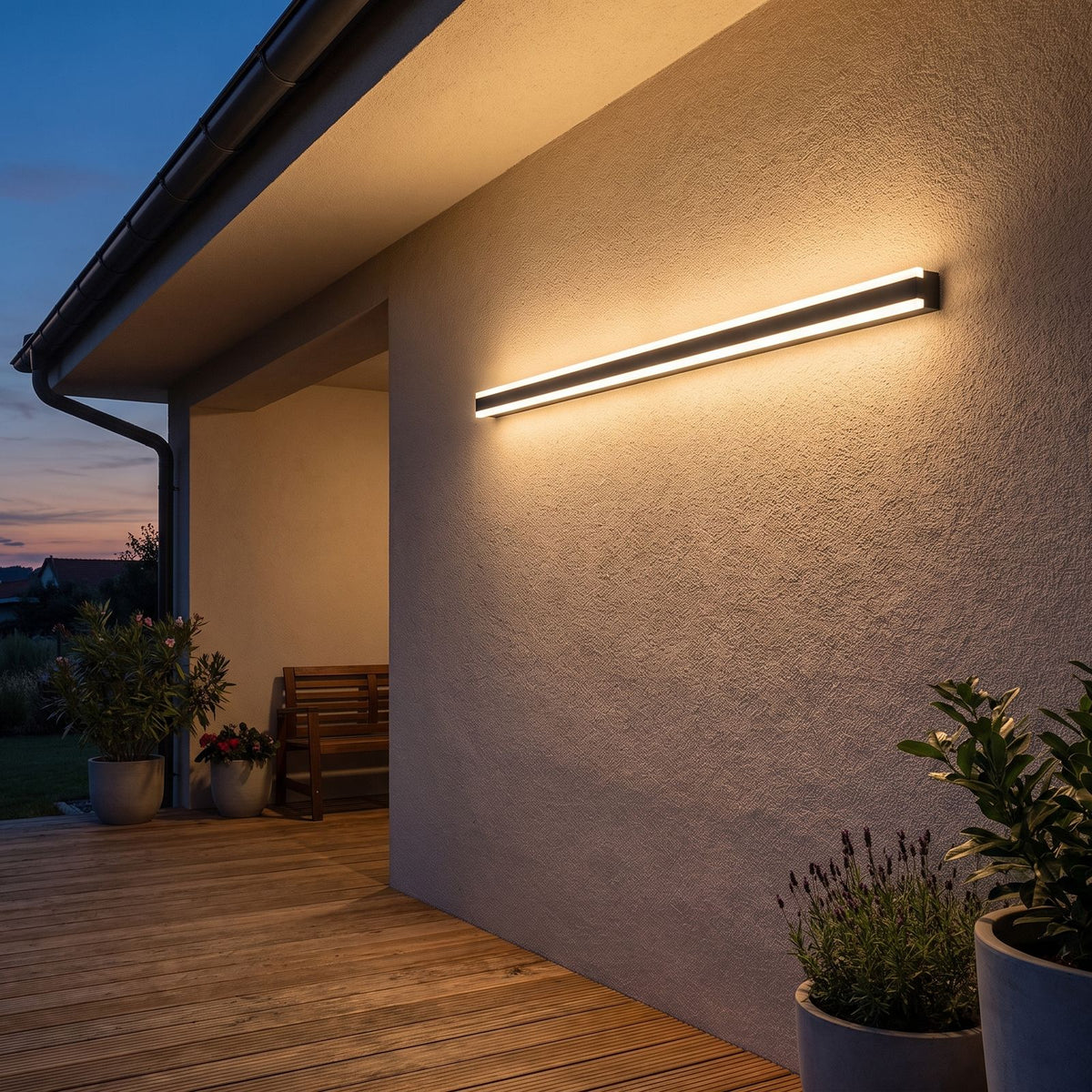 Slim Linear Metal Outdoor Wall Light on a porch wall at dusk