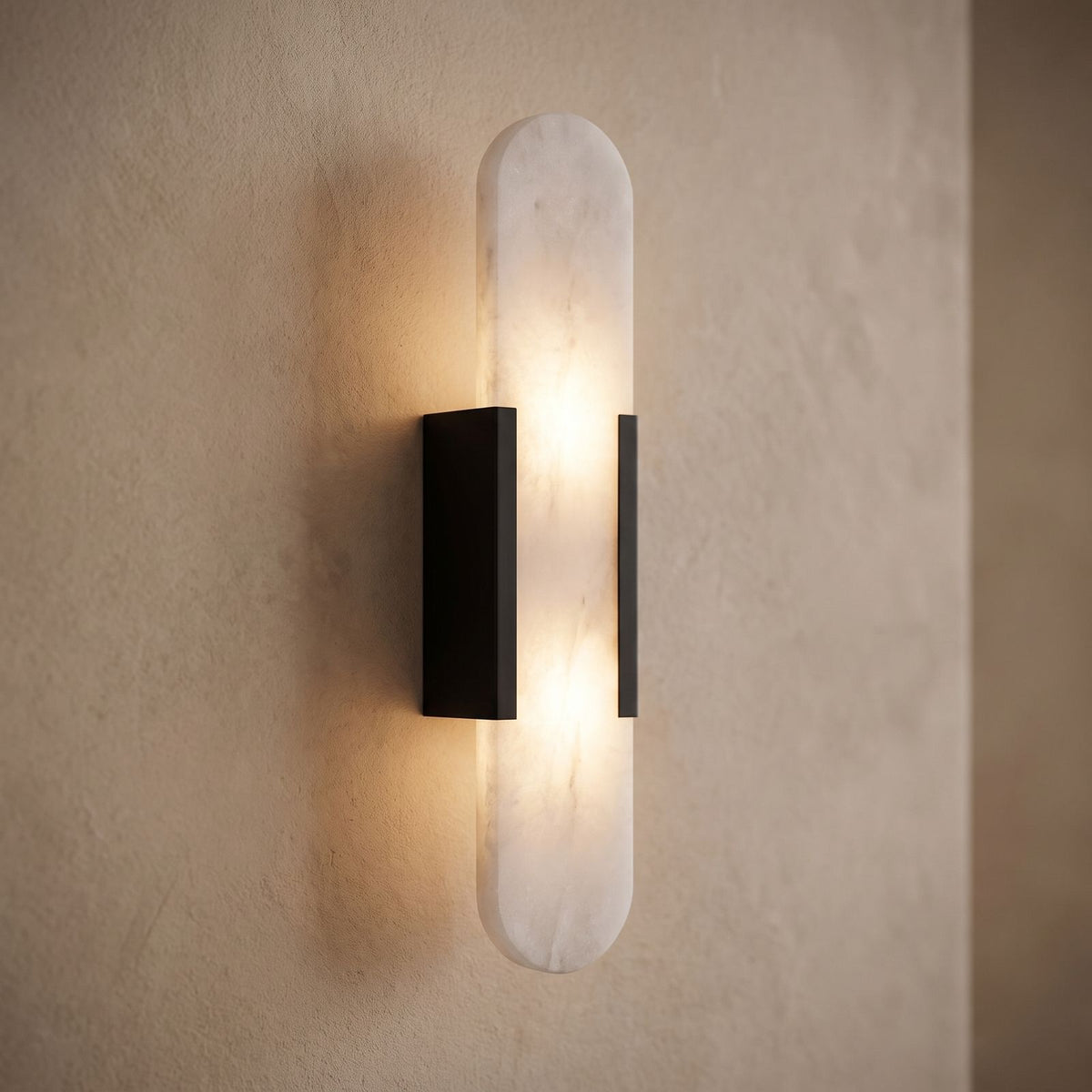 Slim Natural Marble Column Up Down Wall Light, close view at 45 degrees on a plaster wall