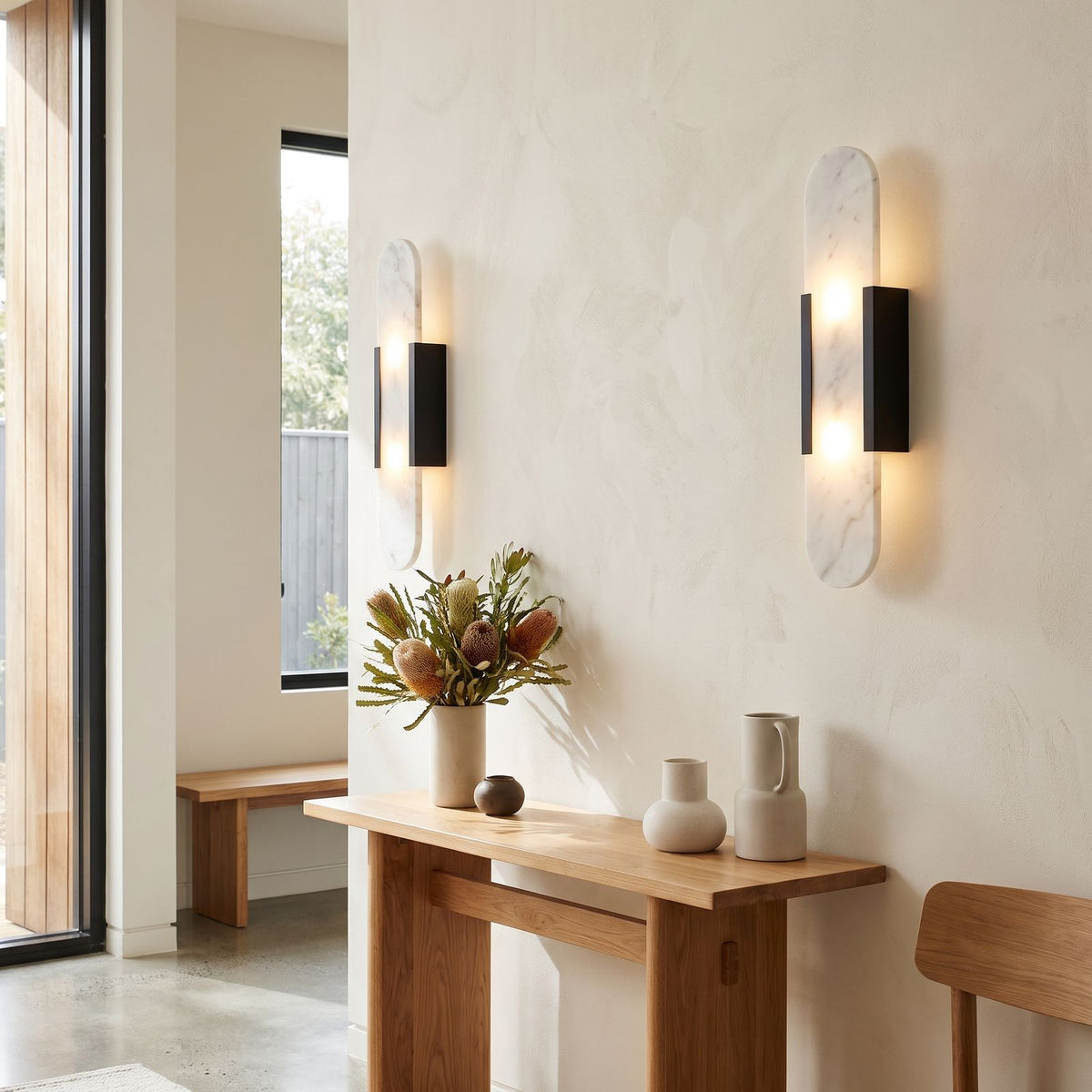 Slim Natural Marble Column Up Down Wall Light in a pair on a wall of an Australian home