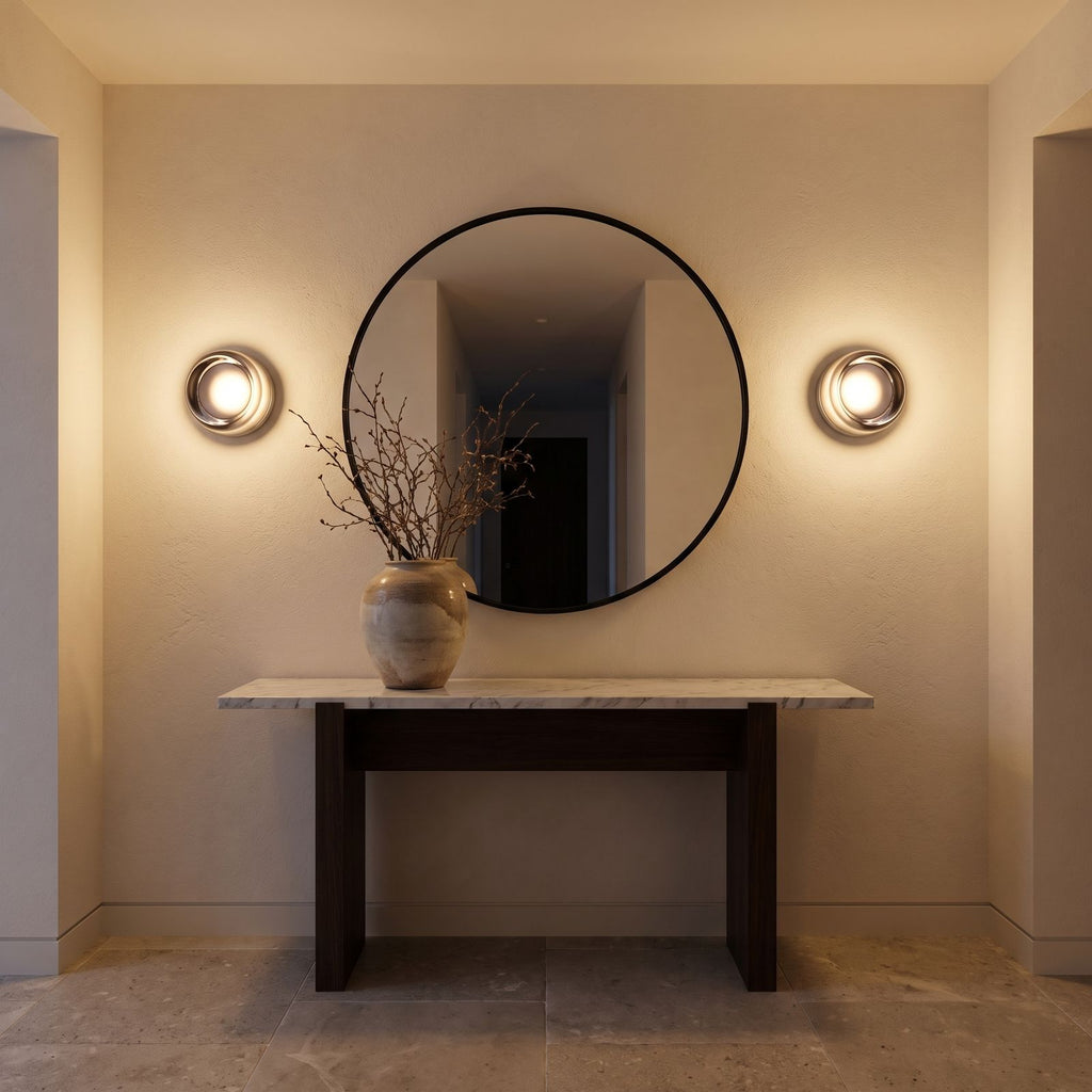 A pair of Smoked Dimple Glass LED Wall Lights either side of a round mirror