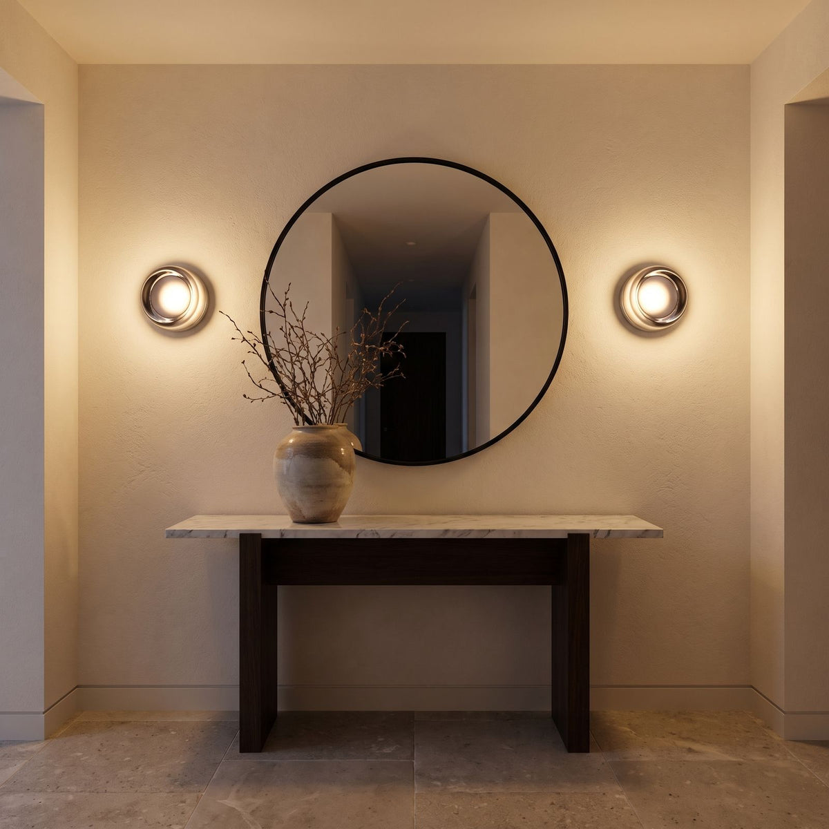 A pair of Smoked Dimple Glass LED Wall Lights either side of a round mirror