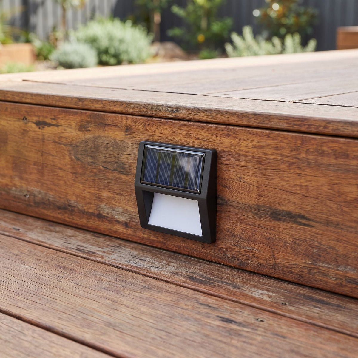 Solar LED Step and Deck Light beside a timber front door