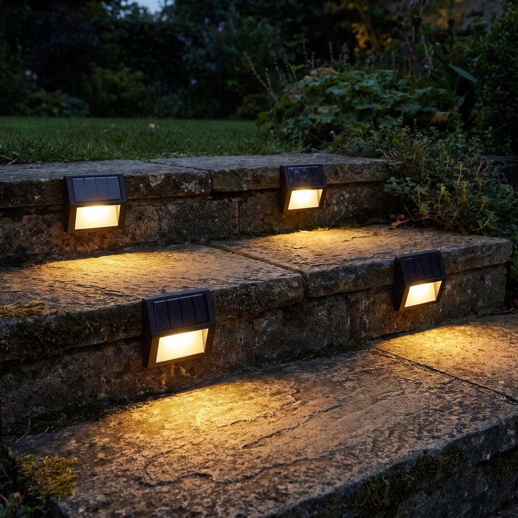 Solar LED Step and Deck Light on a porch wall at dusk