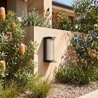 Solar Stainless Steel Box Outdoor Wall Light beside a timber front door