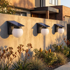 Spherical Solar Outdoor Wall Light in a pair either side of an entry door