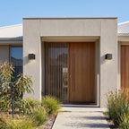 Square Adjustable Beam LED Outdoor Wall Light in a pair on the facade of an Australian home