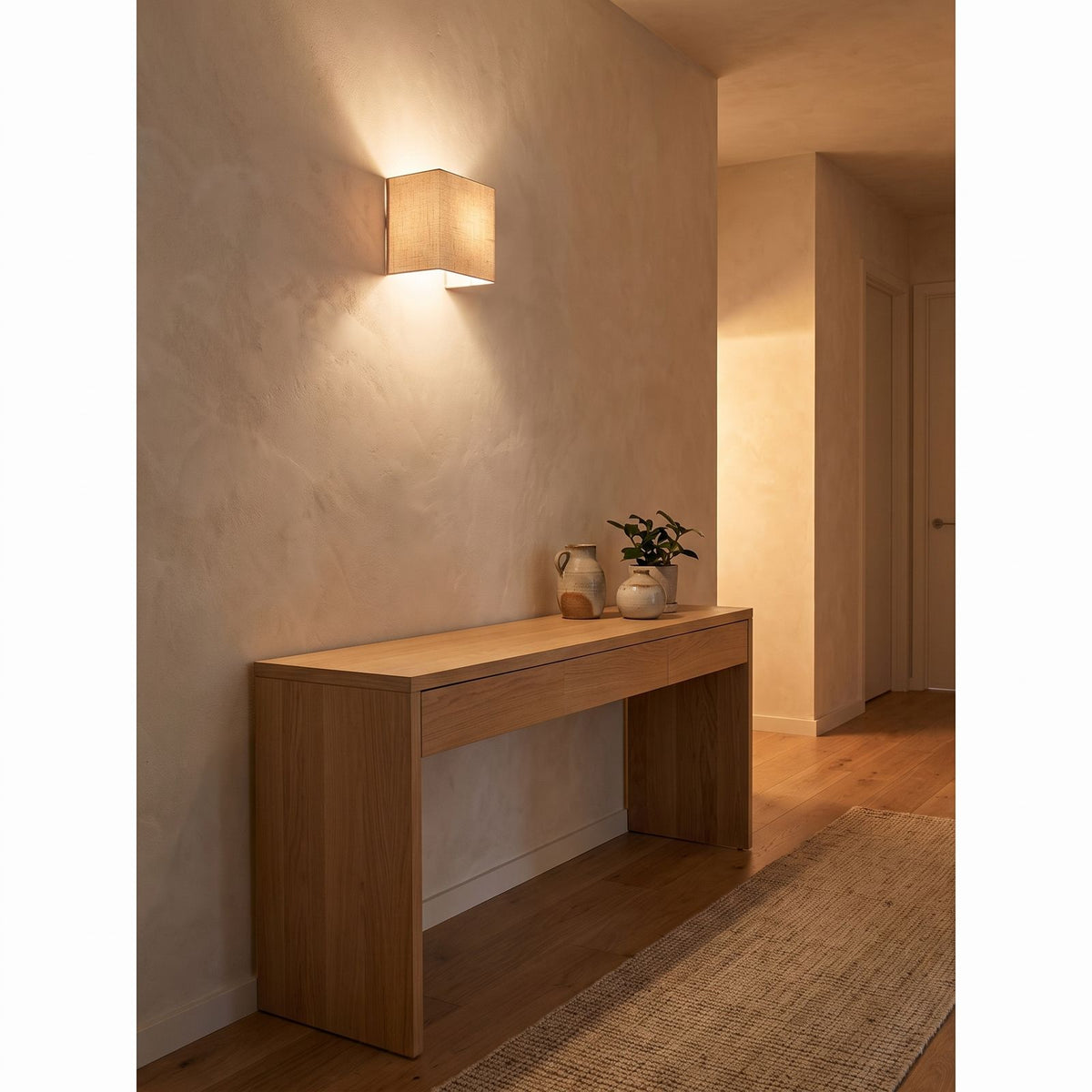 Square Beige Fabric Shade Wall Light in a hallway above a timber console