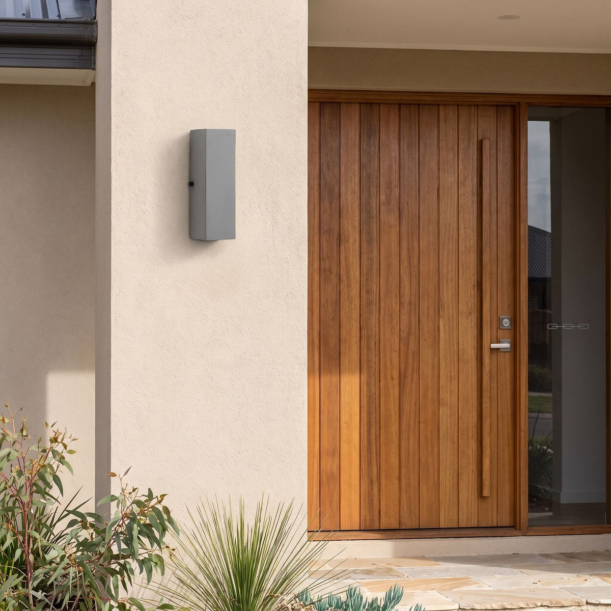 Square Cement Box Outdoor Wall Light beside a timber front door