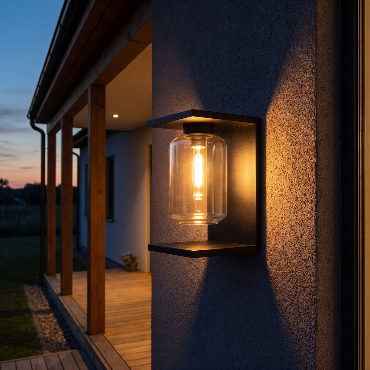 Square Frame Glass Outdoor Wall Lantern on a porch wall at dusk