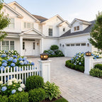 Square Lattice Frame Frosted Glass Pillar Light at the driveway entrance, wide view of the house