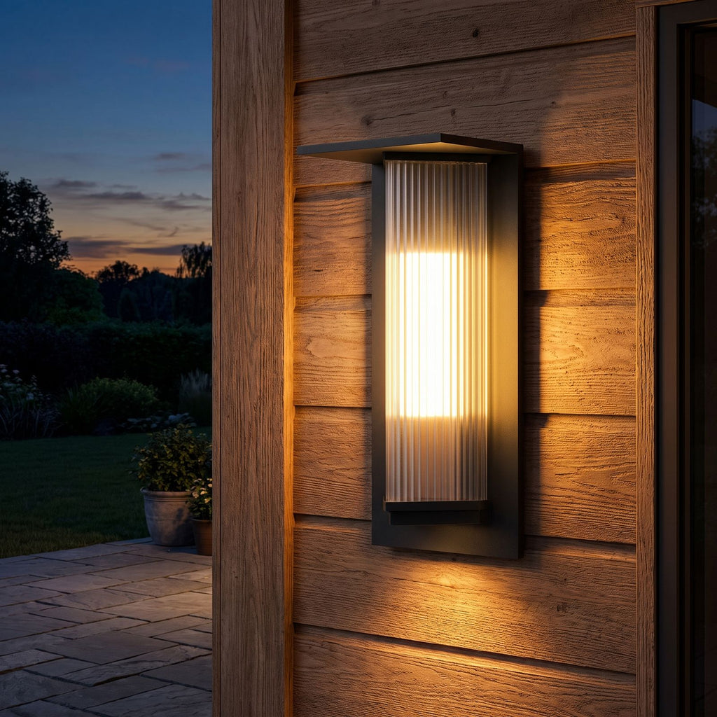 Striped Acrylic Cylinder Outdoor Wall Light on a porch wall at dusk