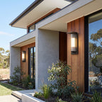 Striped Acrylic Cylinder Outdoor Wall Light in a pair on the facade of an Australian home