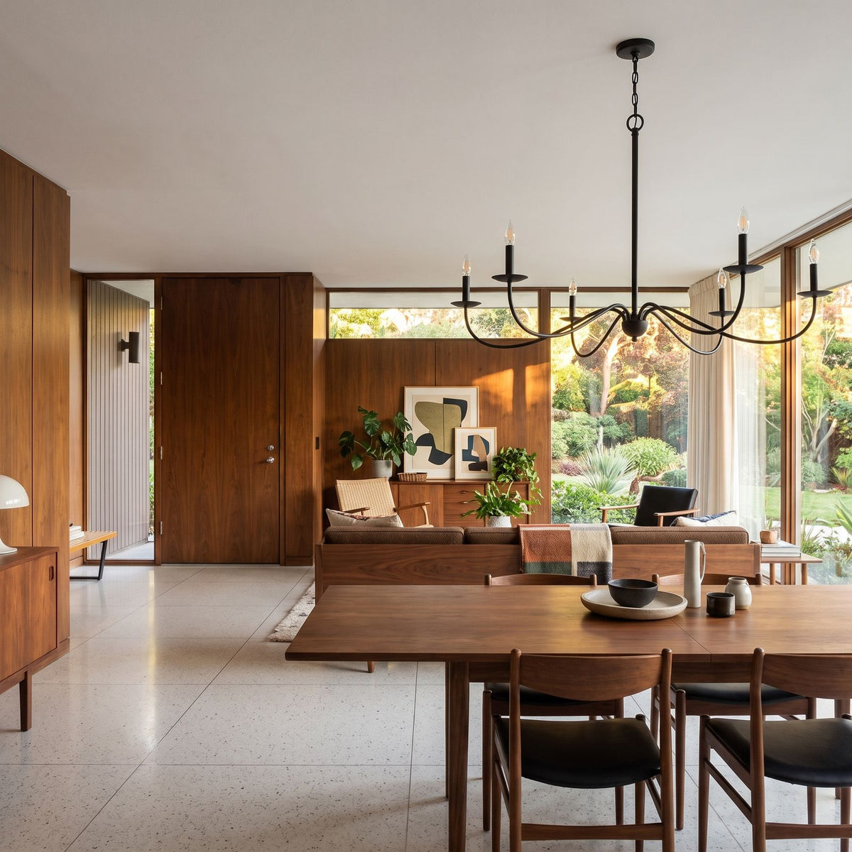 Sweeping Curved Arm Six Light Chandelier in an open-plan living and dining room, wide view