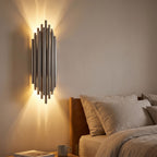 Tall Stainless Steel Up and Down Wall Light in a hallway above a timber console