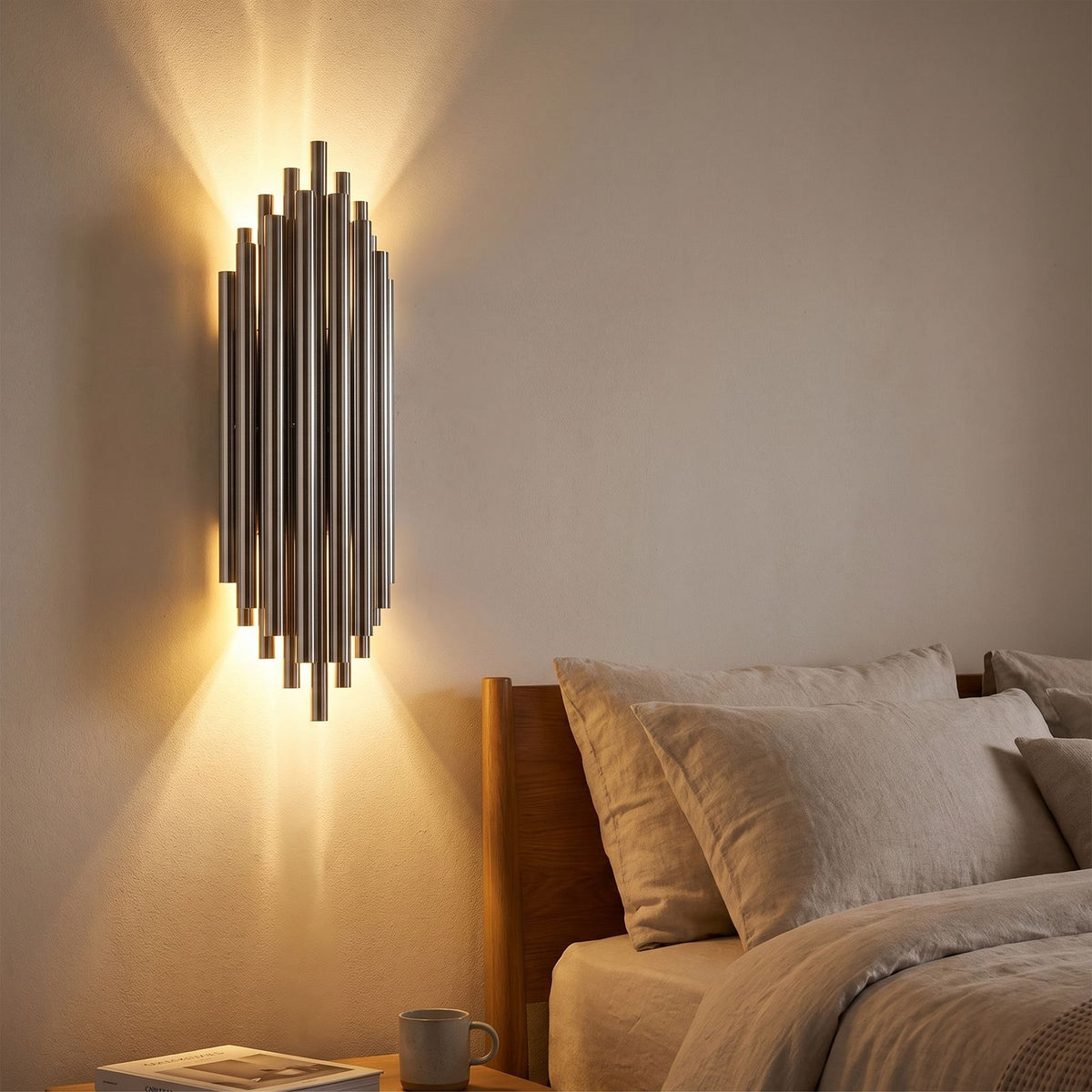 Tall Stainless Steel Up and Down Wall Light in a hallway above a timber console