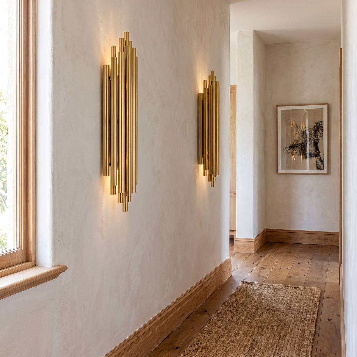 Tall Stainless Steel Up and Down Wall Light in a pair on a wall of an Australian home