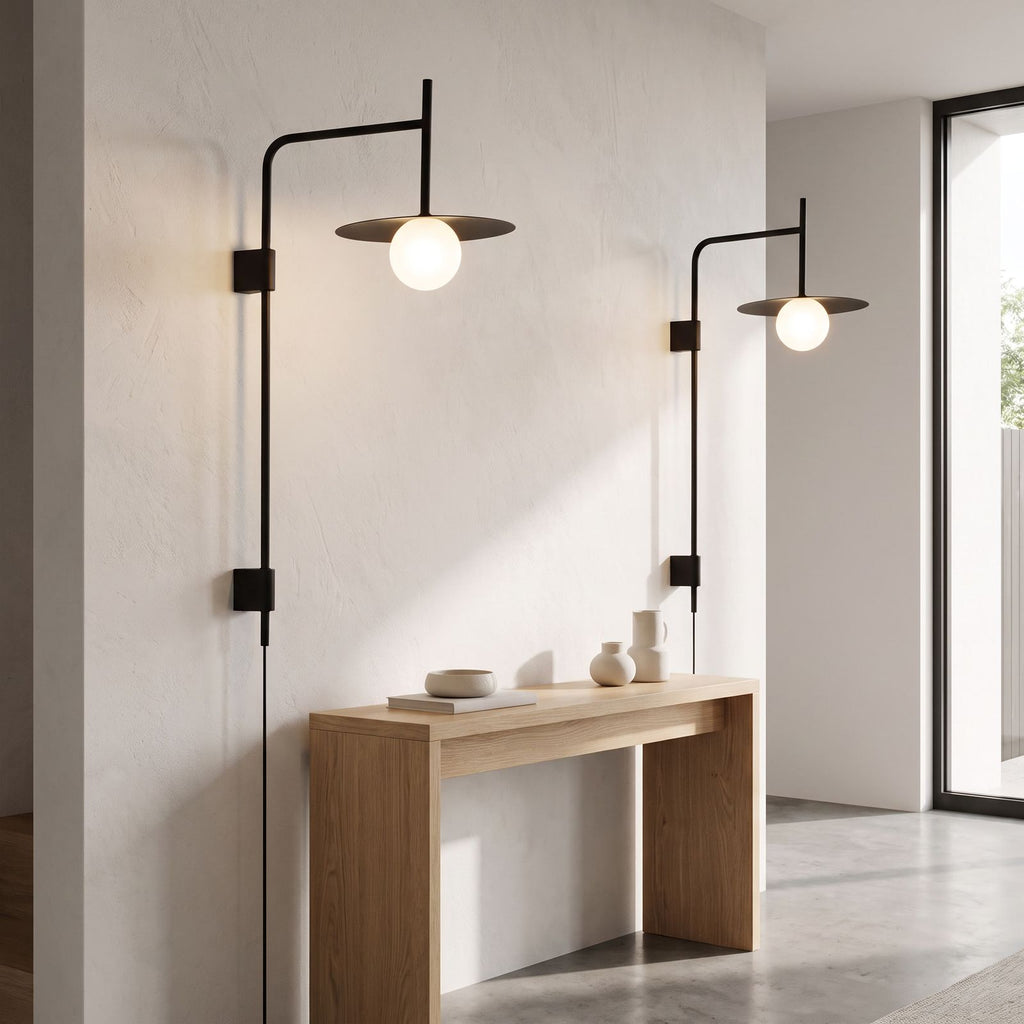 Tall Swing Arm Globe Plug-In Wall Light in a pair on a wall of an Australian home