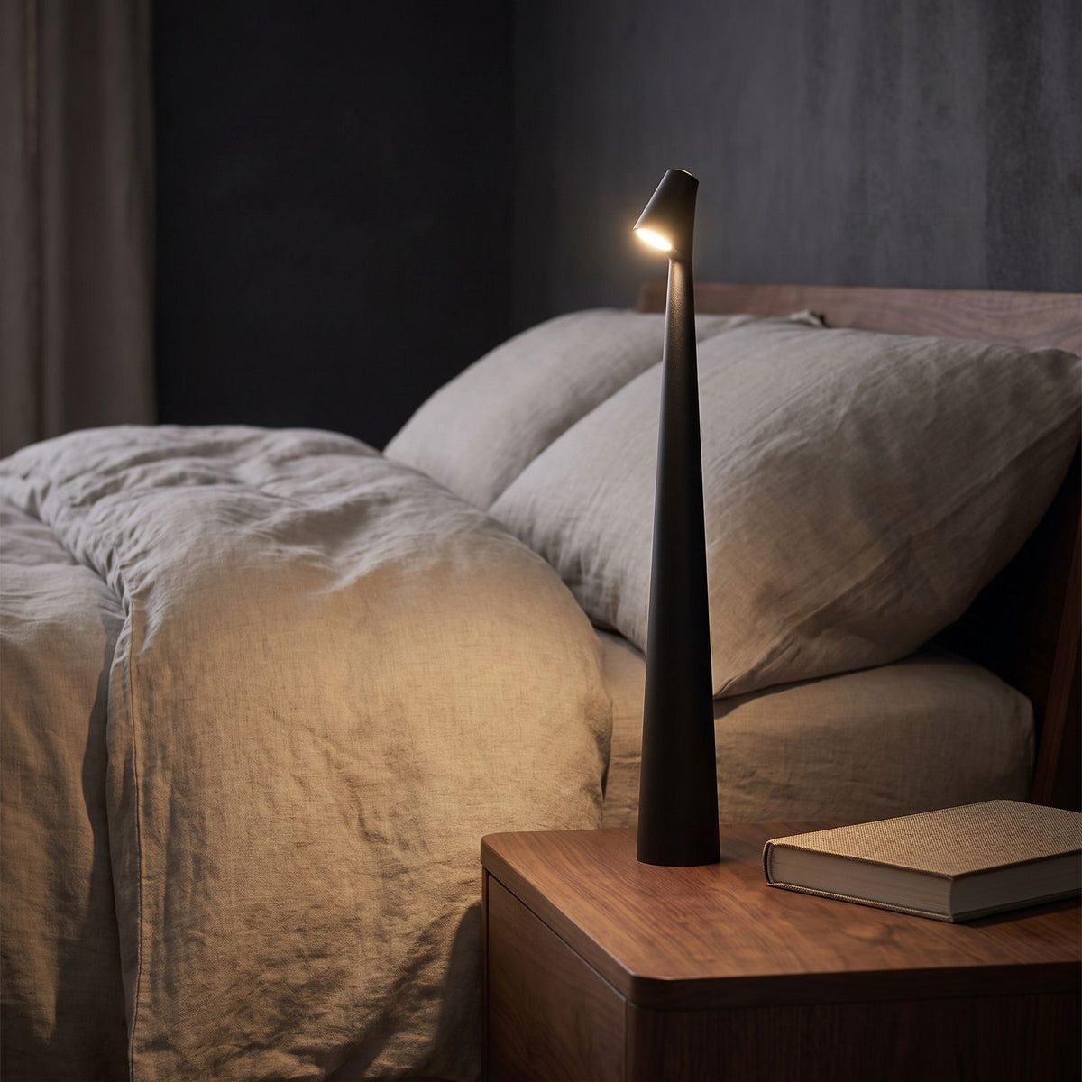 Tall Tapered Aluminium Rechargeable Table Lamp in a styled Australian interior with the light on