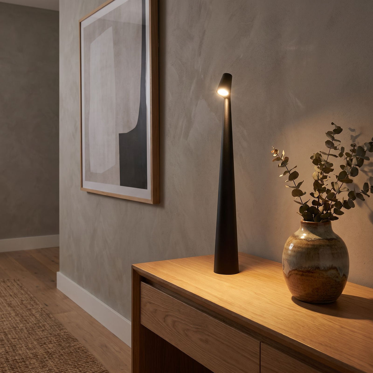Tall Tapered Aluminium Rechargeable Table Lamp lighting a second setting in an Australian home