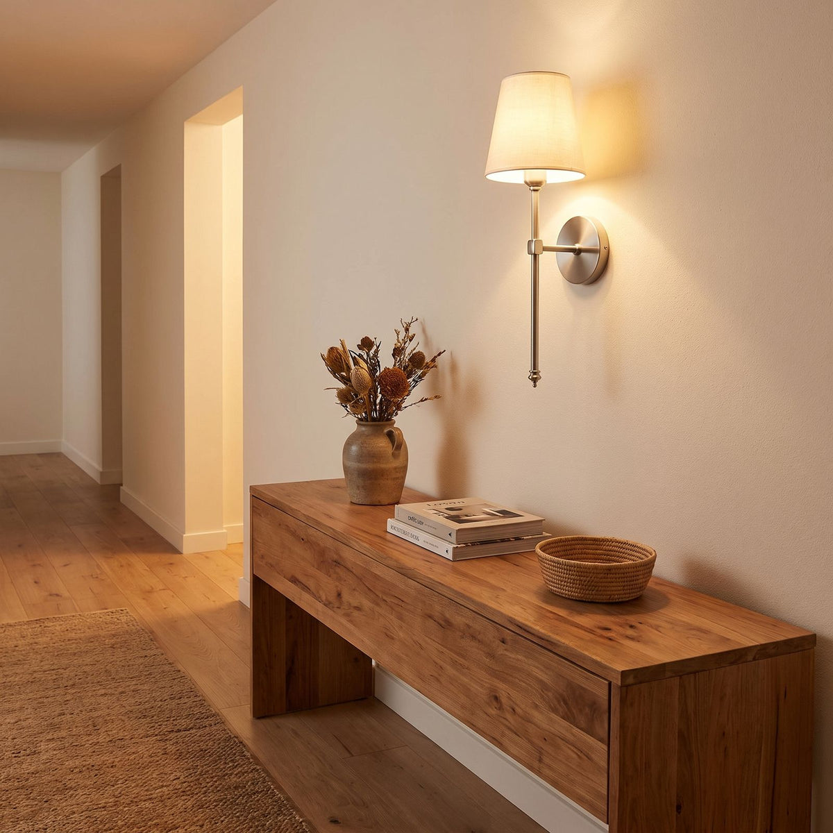 Tapered Fabric Shade Wireless Wall Sconce in a hallway above a timber console