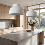 Textured Polystyrene Dome Pendant Light over a stone kitchen island