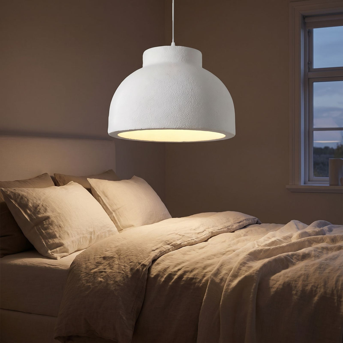 Textured Polystyrene Dome Pendant Light above a bed
