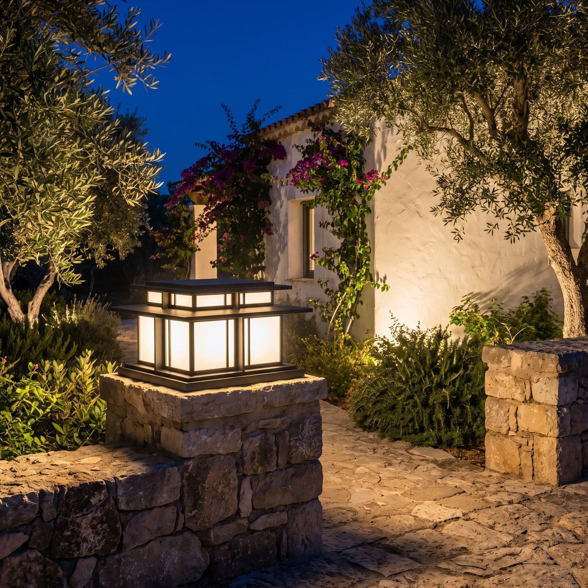 Tiered Roof Black Metal Frosted Acrylic Pillar Light on a garden wall pillar at night