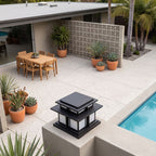 Tiered Roof Black Metal Frosted Acrylic Pillar Light on a courtyard terrace pillar in daylight