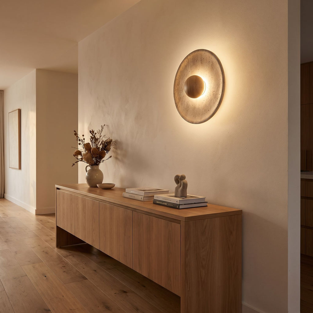 Timber Shade Travertine Wall Light in a hallway above a timber console