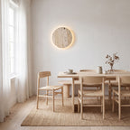 Travertine and Frosted Glass Up Down Wall Light on a dining room wall