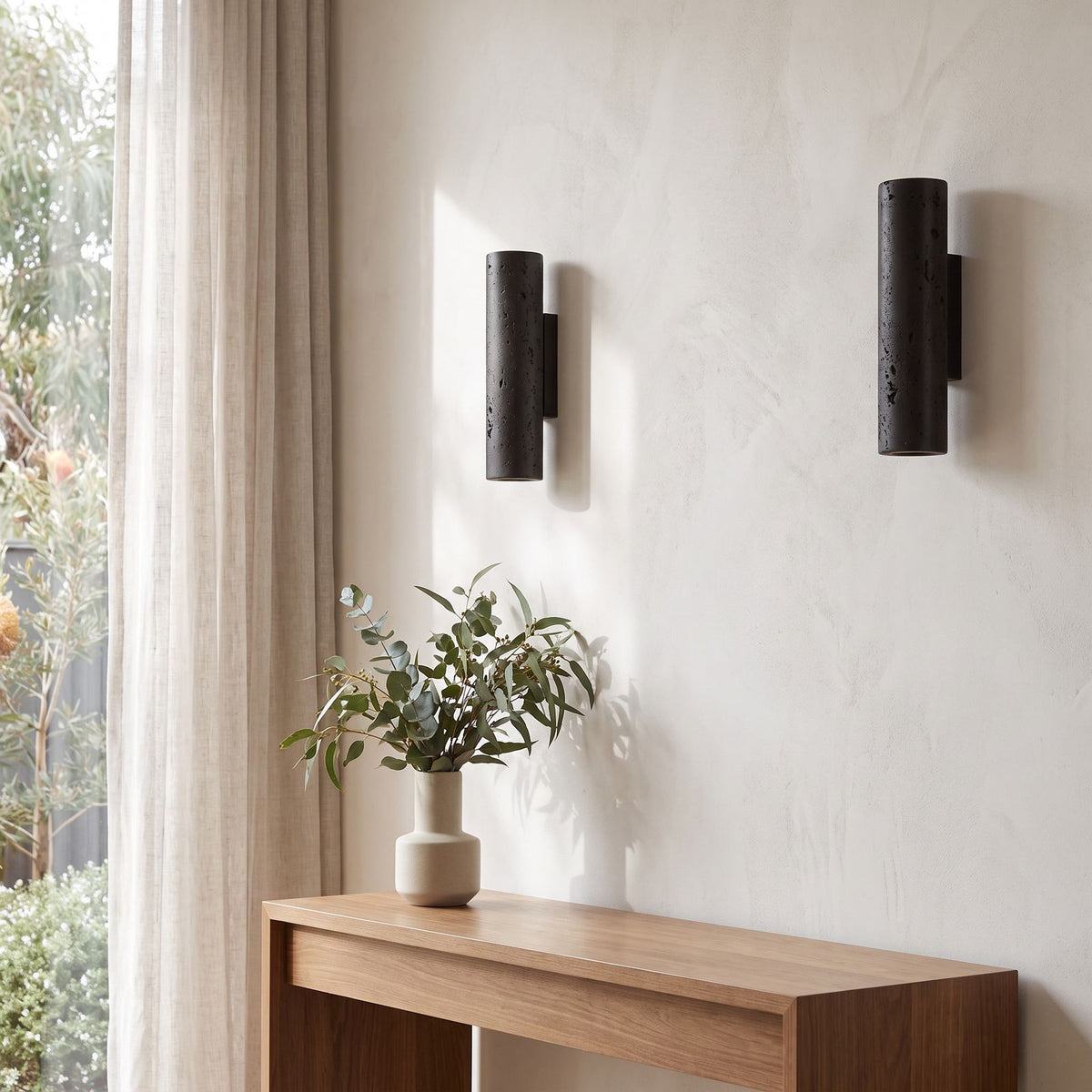 Travertine Cylinder Integrated LED Wall Light in a pair on a wall of an Australian home