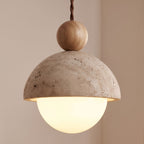 Close-up of the travertine dome, wood ball and opal glass globe