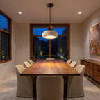 Travertine Donut and Wood Ball Pendant Light above a timber dining table