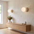 Travertine Half Dome Glass Orb Wall Light in a pair on a wall of an Australian home