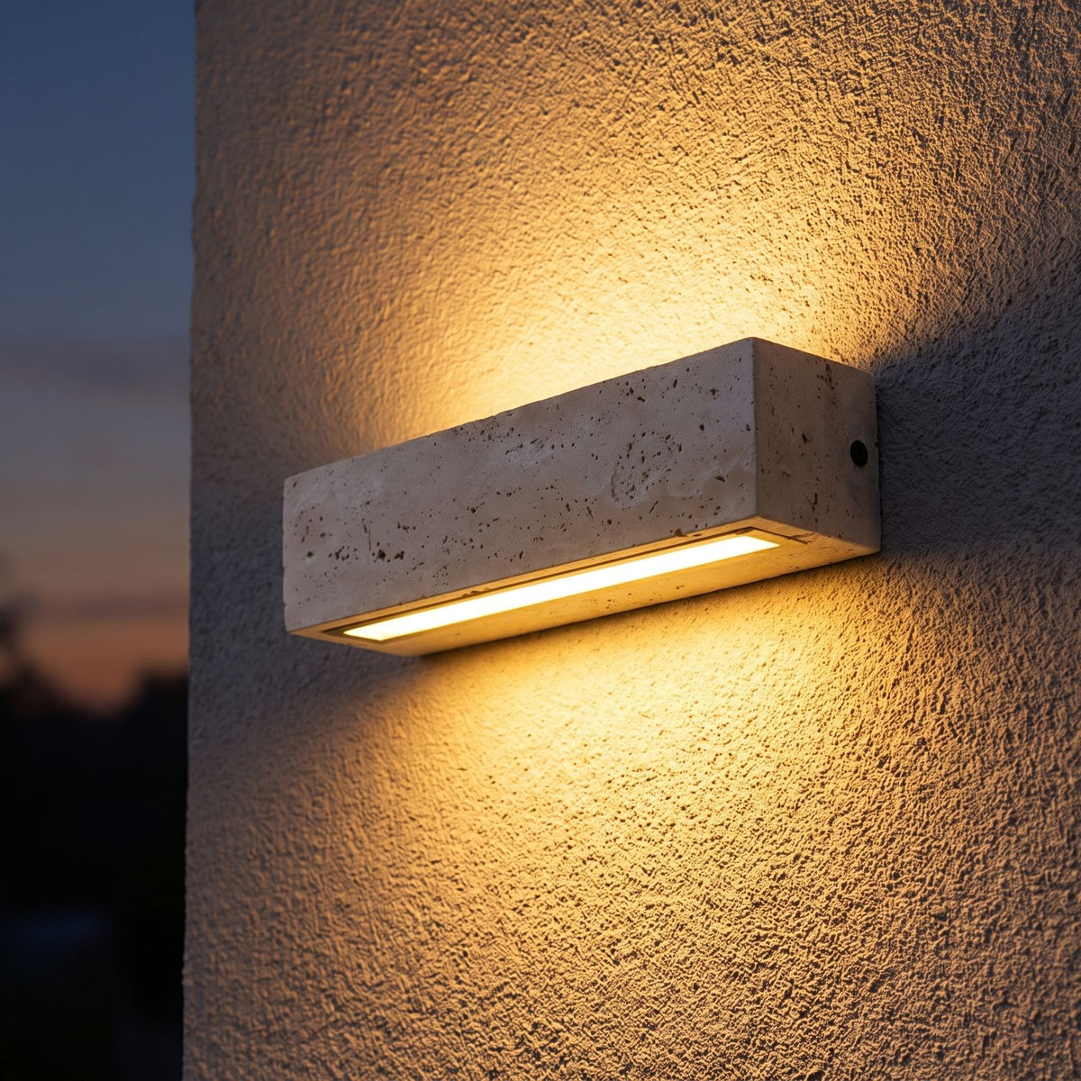 Travertine Look Resin Linear Up Down Outdoor Wall Light on a porch wall at dusk