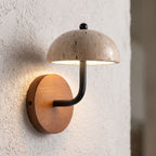 Travertine Mushroom Dome Bedside Wall Light, close view at 45 degrees on a plaster wall