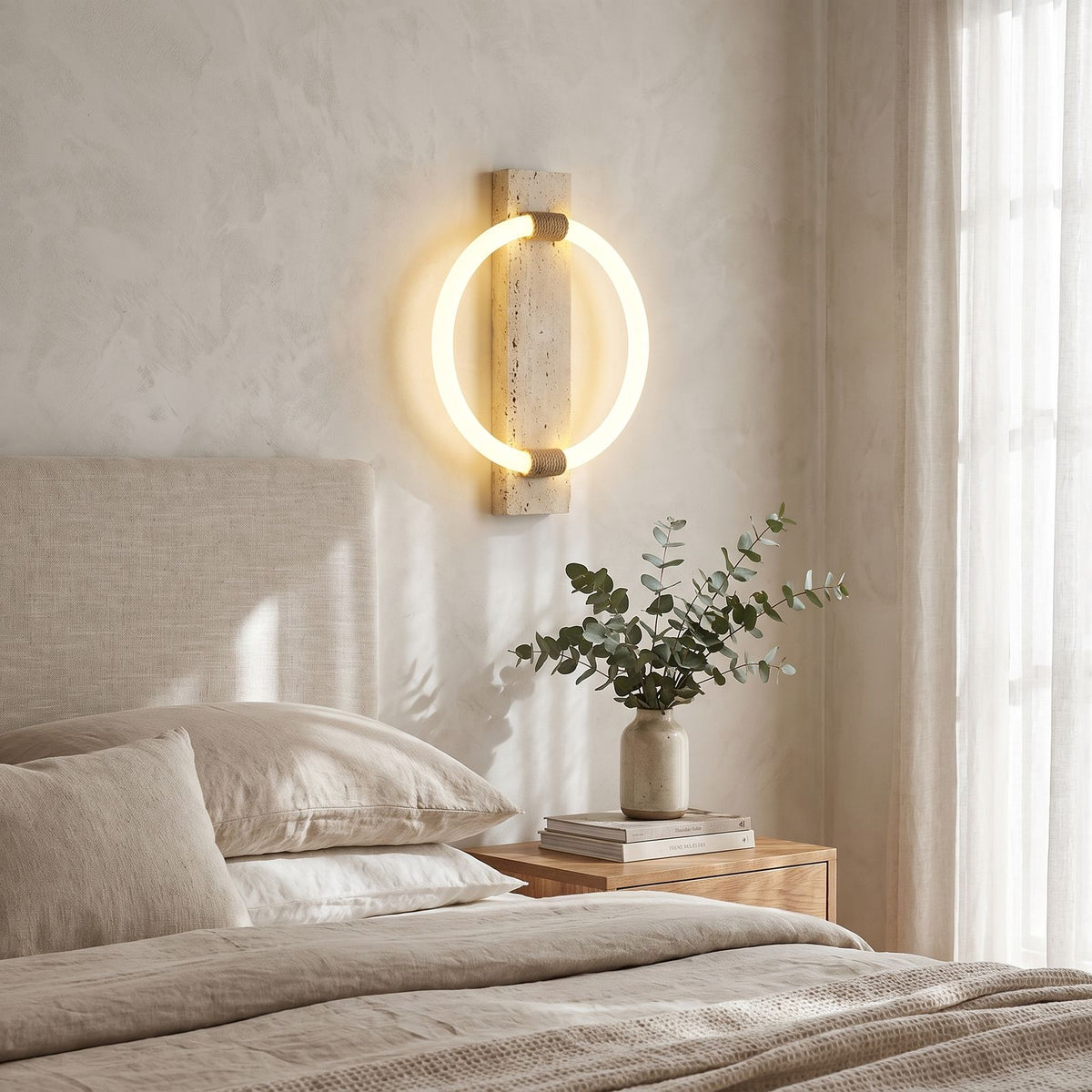 Travertine Plank and LED Ring Wall Light on a bedroom wall beside the bed
