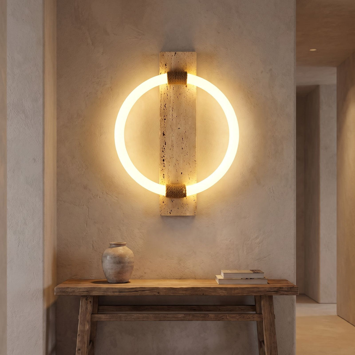 Travertine Plank and LED Ring Wall Light in a hallway above a timber console