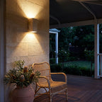 Travertine Stone Outdoor Up Down Wall Light on a covered verandah