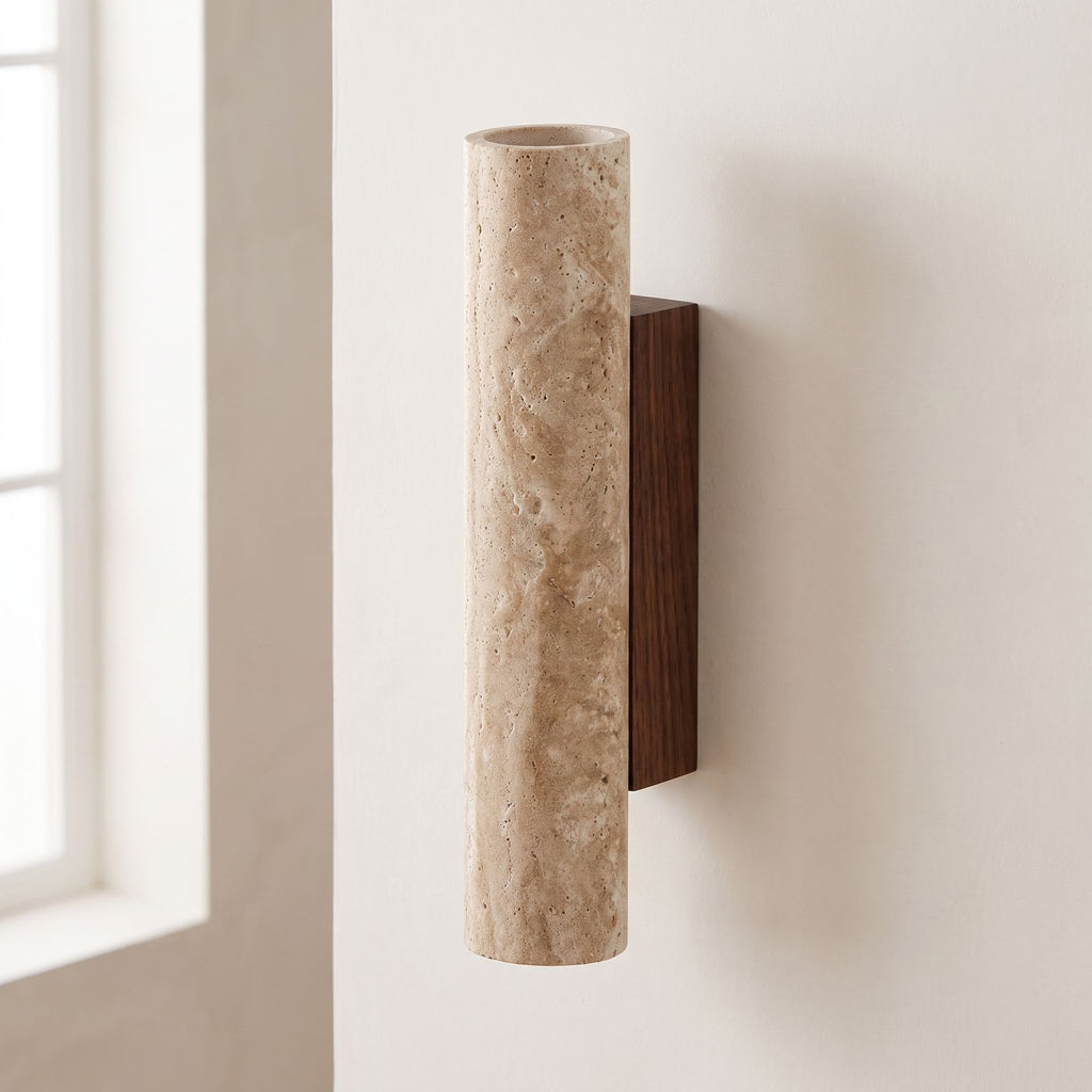 Travertine Tube Up Down Wall Light on a plaster wall in daylight