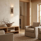 Travertine Tube Up Down Wall Light in a living room