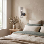 Twin Coloured Glass Shade Wall Light on a bedroom wall beside the bed