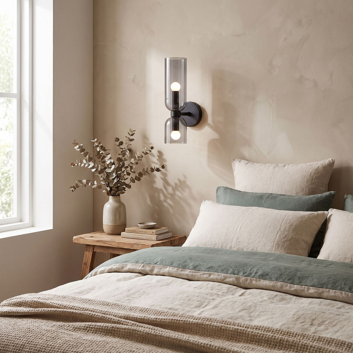 Twin Coloured Glass Shade Wall Light on a bedroom wall beside the bed